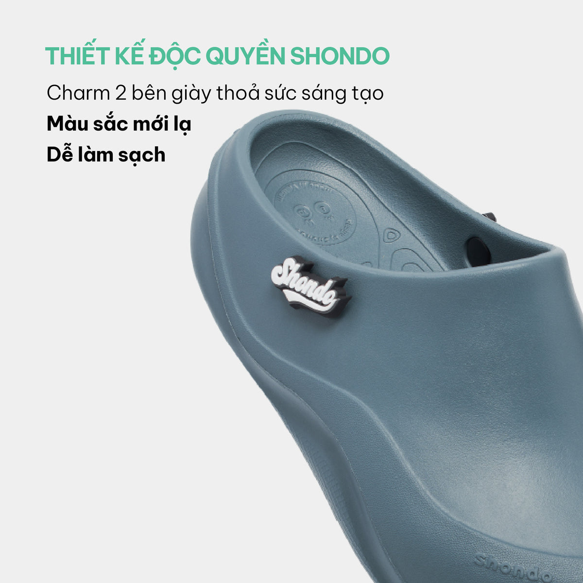 Clog Suke nam nữ nhựa đúc gắn charm xanh dương đậm